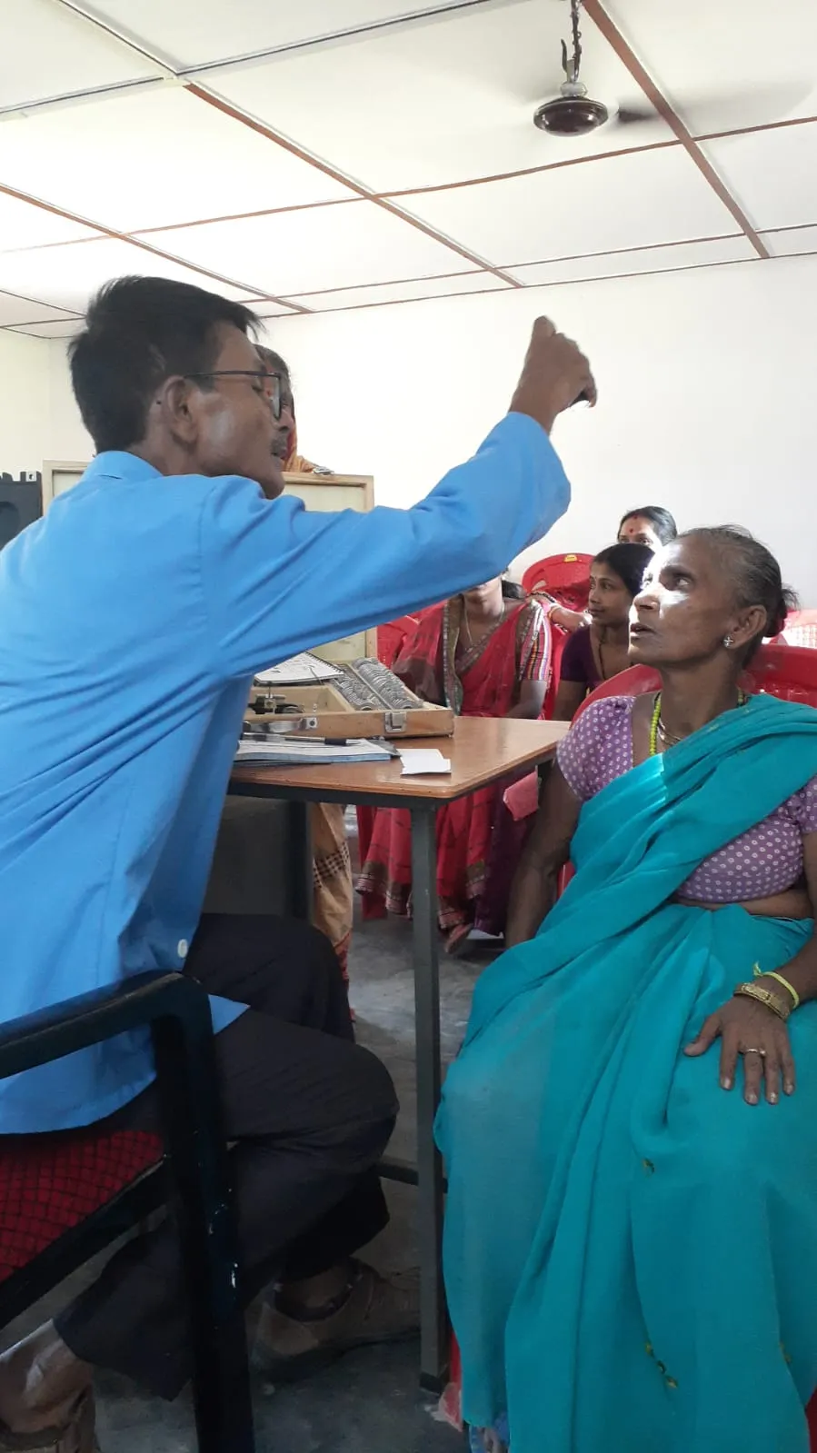 Refraction screening for local community members.